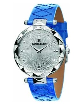 Montre pour femme Daniel Klein avec un bracelet cuir diamètre 3,2 cm, garantie 2 ans.